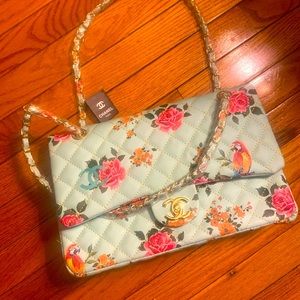 Beautiful Chanel floral bag with duster